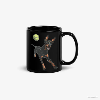 Dobermann Mug – Unisex Black Mug Classic – Playing with a Tennis Ball (on White Background)