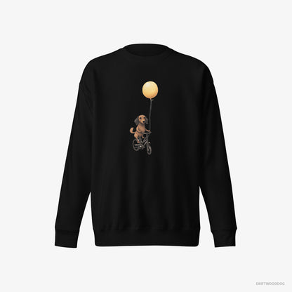 Dachshund Riding a Bicycle with a Balloon Black Sweatshirt