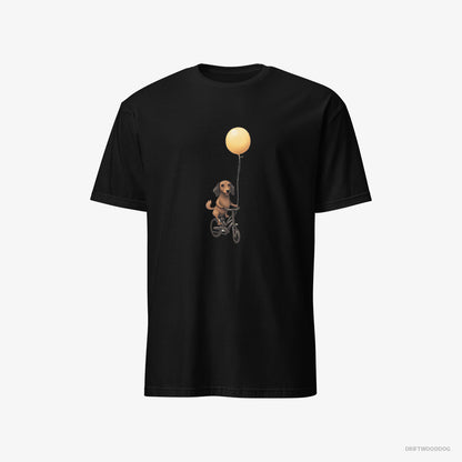 Dachshund Riding a Bicycle with a Balloon Black T-Shirt