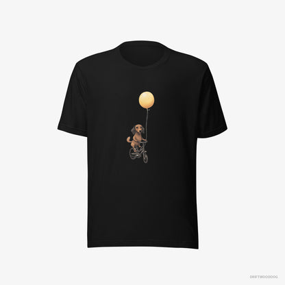 Dachshund T-Shirt – Men Black T-Shirt Eco-Friendly – Riding a Bicycle with a Balloon (on White Background)