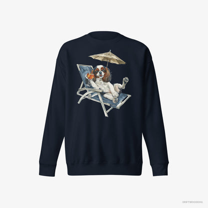 Cavalier King Charles Spaniel Sweatshirt – Women Navy Sweatshirt Eco-Friendly – Lying on a Sun Lounger (on White Background)