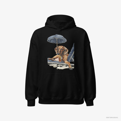 Dachshund Hoodie – Men Black Hoodie Classic – Lying on a Sun Lounger (on White Background)