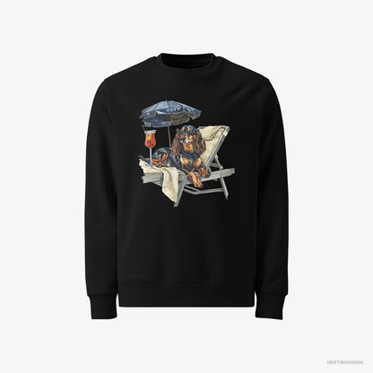 Dachshund Sweatshirt – Men Black Sweatshirt Classic – Relaxing on a Patio Lounger with a Cocktail (on White Background)