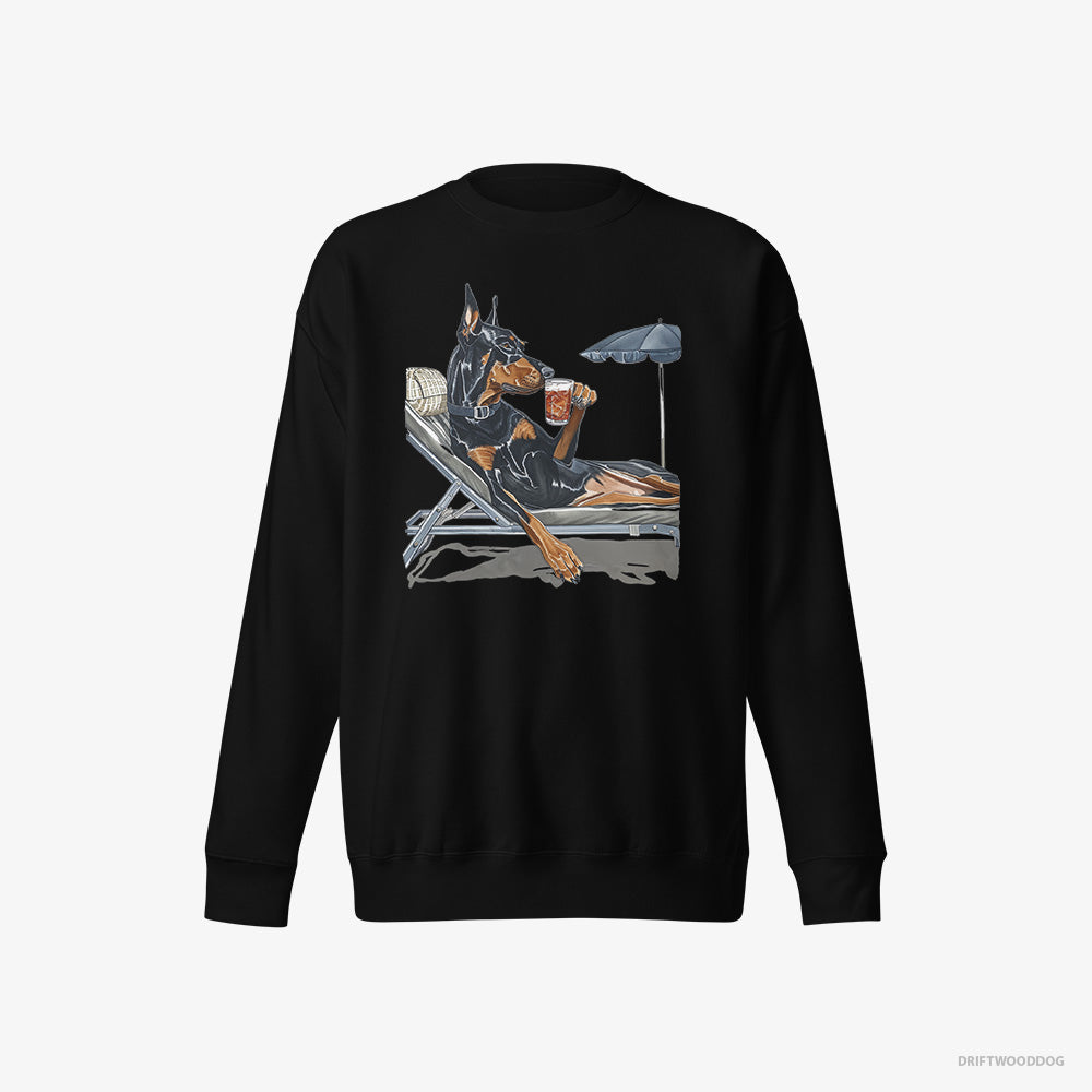 Dobermann Sweatshirt – Men Black Sweatshirt Eco-Friendly – Lying on a Sun Lounger with a Cocktail (on White Background)