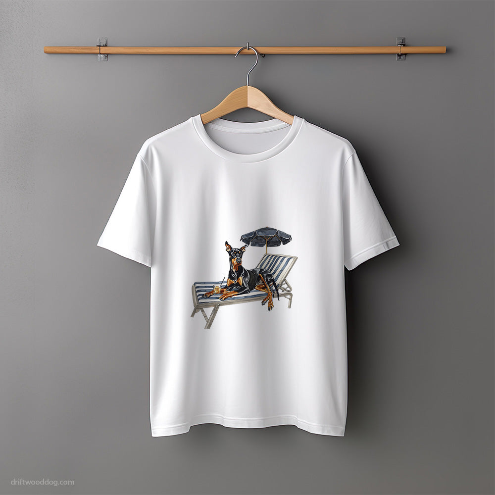 Dobermann Relaxing on a Sunbed T-Shirt – Unisex Tee for Dog Lovers