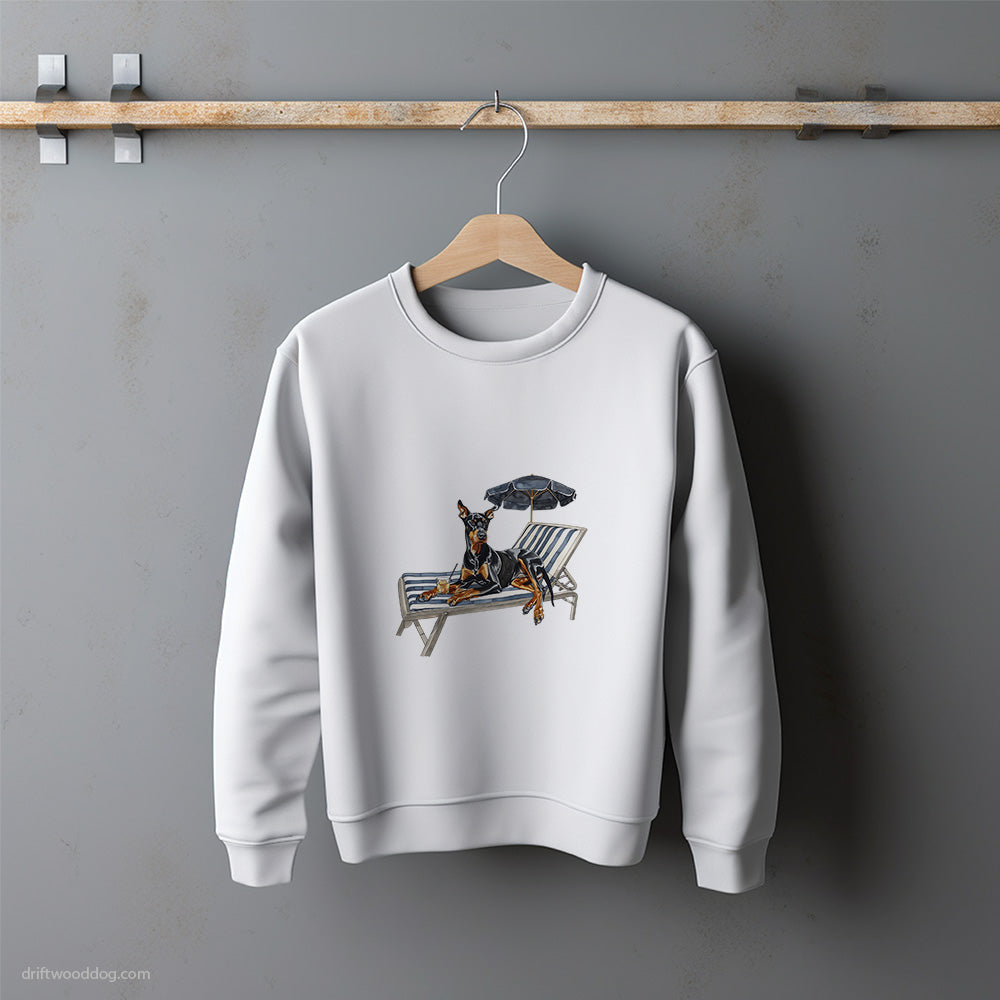 Dobermann Relaxing on a Sunbed Sweatshirt – Unisex Sweatshirt for Dog Lovers