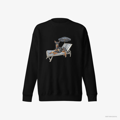 Dobermann Sweatshirt – Men Black Sweatshirt Eco-Friendly – Relaxing on a Sunbed (on White Background)