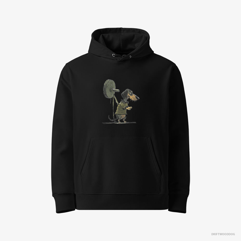 Dachshund Hoodie – Women Black Hoodie Eco-Friendly – Powerlifting at the Gym (on White Background)