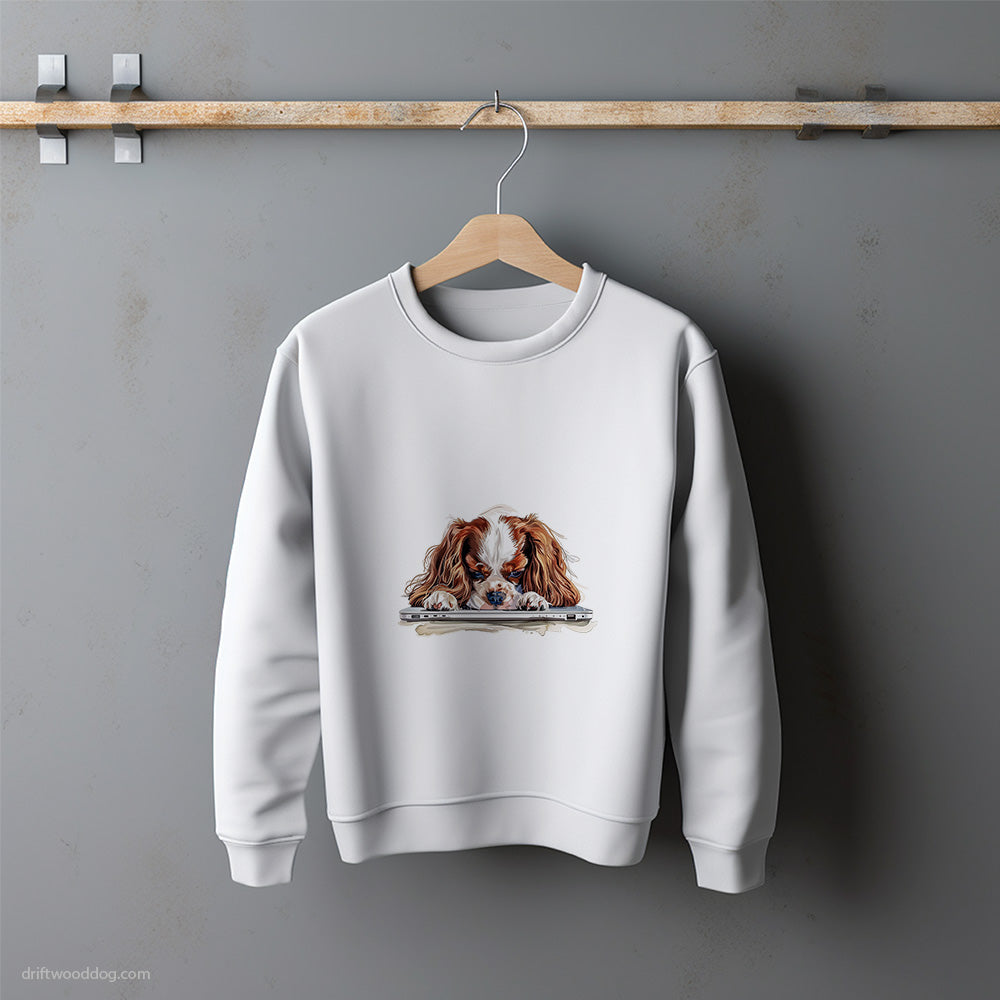 Cavalier King Charles Spaniel Lying on a Computer Sweatshirt – Unisex Sweatshirt for Dog Lovers