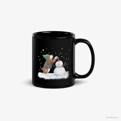 Basset Hound Mug – Unisex Black Mug Classic – Crafting a Snowman (on White Background)