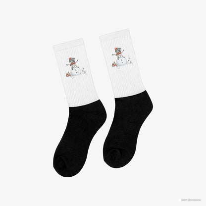 Yorkshire Terrier Building a Snowman White and Black Socks