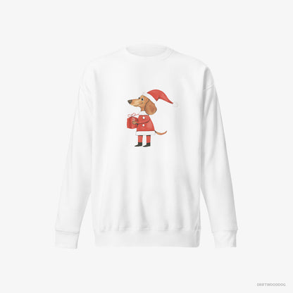 Dachshund Sweatshirt – Women White Sweatshirt Eco-Friendly – Dressed as Santa with a Christmas Present (on White Background)