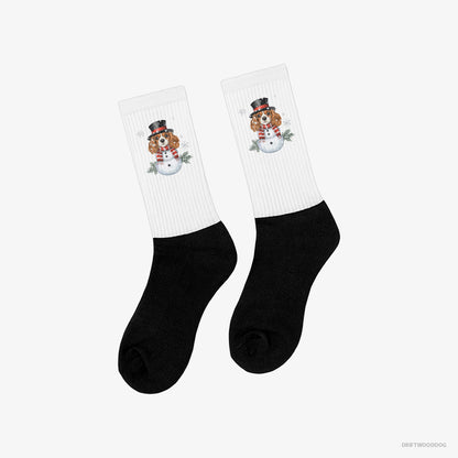 Cavalier King Charles Spaniel Playing a Snowman White and Black Socks