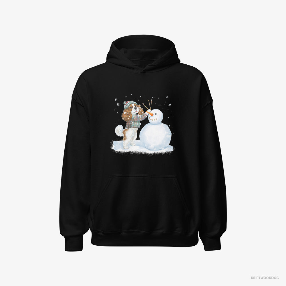 Cavalier King Charles Spaniel Hoodie – Women Black Hoodie Classic – Sculpting a Snowman (on White Background)