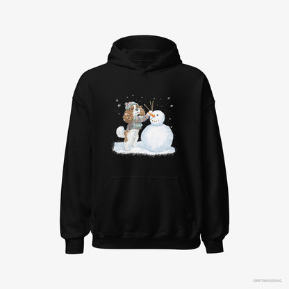 Cavalier King Charles Spaniel Sculpting a Snowman Black Hoodie