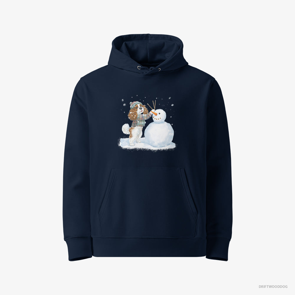 Cavalier King Charles Spaniel Hoodie – Women Navy Hoodie Eco-Friendly – Sculpting a Snowman (on White Background)