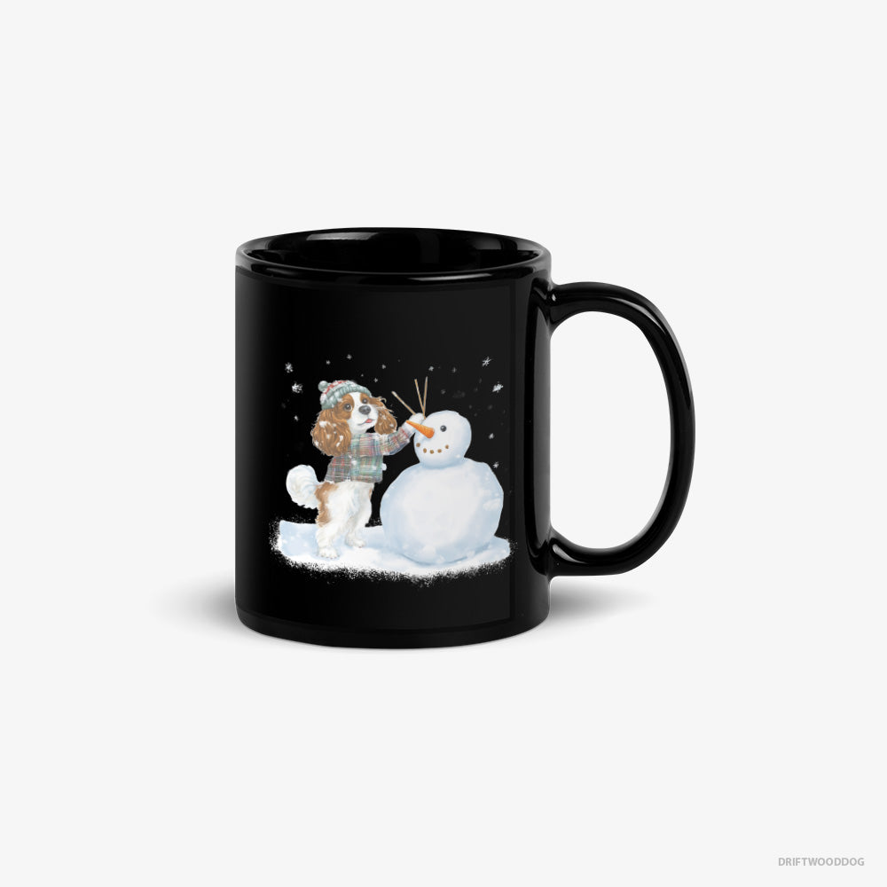 Cavalier King Charles Spaniel Mug – Unisex Black Mug Classic – Sculpting a Snowman (on White Background)