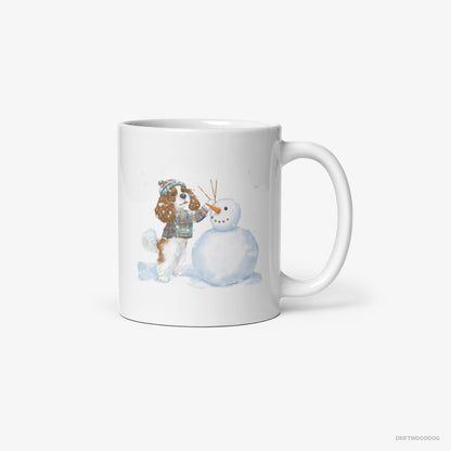 Cavalier King Charles Spaniel Sculpting a Snowman White Mug