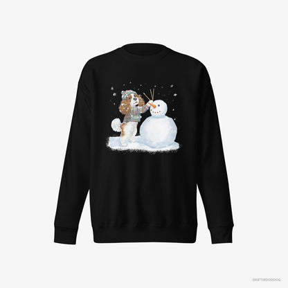 Cavalier King Charles Spaniel Sculpting a Snowman Black Sweatshirt