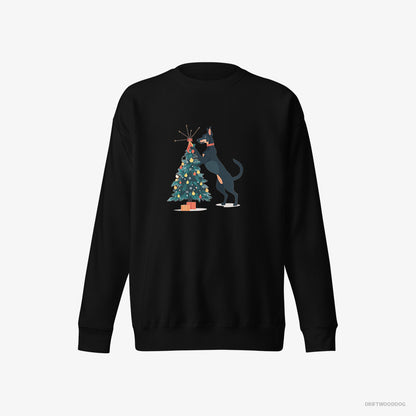 Dobermann Sweatshirt – Women Black Sweatshirt Eco-Friendly – Putting Ornaments on the Christmas Tree (on White Background)