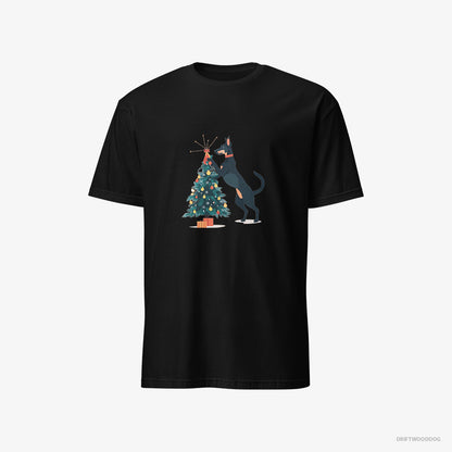 Dobermann Putting Ornaments on the Christmas Tree Black T-Shirt