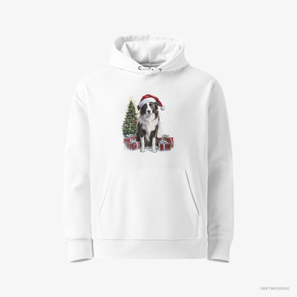 Border Collie Sitting Next to a Christmas Tree and Gifts White Hoodie