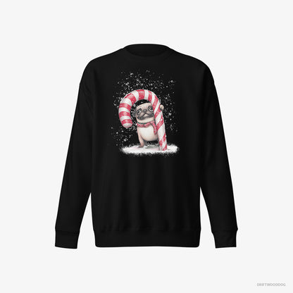 Pug Sweatshirt – Men Black Sweatshirt Eco-Friendly – Holding a Giant Christmas Candy Cane (on White Background)