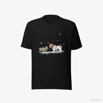 Cavalier King Charles Spaniel T-Shirt – Men Black T-Shirt Eco-Friendly – Sledding with Puppies (on White Background)