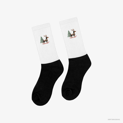 Dobermann Skiing with Reindeer Antlers White and Black Socks